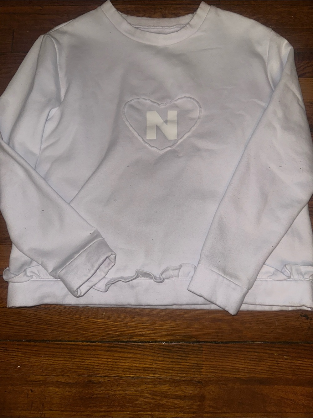 Nicopanda Soft White Crewneck Sweatshirt – Embroidered Heart N Logo, Ruffle Hem